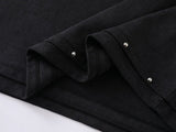 DAXUEN Oversized t-shirt with studded details and abstract logo