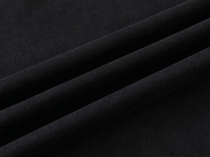DAXUEN Oversized t-shirt with studded details and abstract logo
