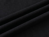 DAXUEN Oversized t-shirt with studded details and abstract logo