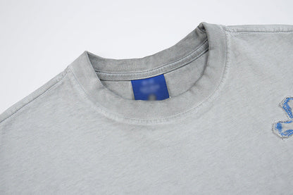 DAXUEN Distressed cross patch short-sleeved T-shirt