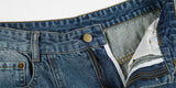 DAXUEN Baggy denim jeans with wide-leg silhouette and raw edge details