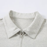 DAXUEN Light grey oversized polo shirt with red embroidery