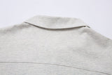 DAXUEN Light grey oversized polo shirt with red embroidery
