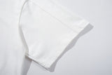 DAXUEN Relaxed-fit short-sleeve T-shirt with script embroidery