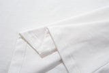 DAXUEN Relaxed-fit short-sleeve T-shirt with script embroidery