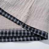 DAXUEN Layered oversized short-sleeve T-shirt with plaid detail
