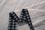 DAXUEN Layered oversized short-sleeve T-shirt with plaid detail