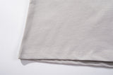 DAXUEN Oversized short-sleeved T-shirt with layered neckline design