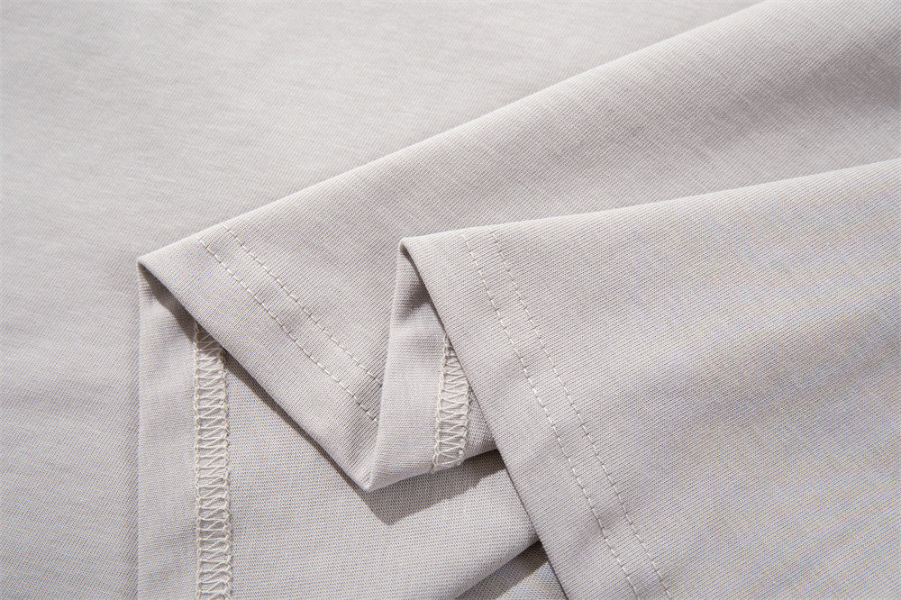 DAXUEN Oversized short-sleeved T-shirt with layered neckline design