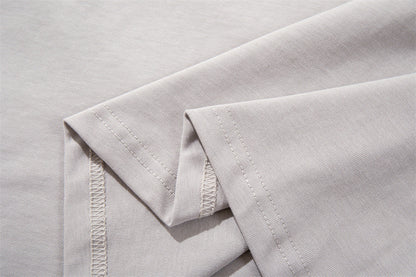 DAXUEN Oversized short-sleeved T-shirt with layered neckline design