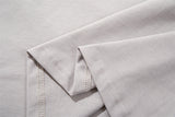 DAXUEN Oversized short-sleeved T-shirt with layered neckline design