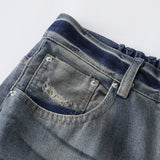 DAXUEN Distressed wide-leg jeans in washed light blue denim