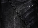 DAXUEN Distressed black wide-leg denim jeans with paint splatters