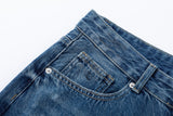 DAXUEN Distressed medium-blue wide leg denim jeans with paint splatters