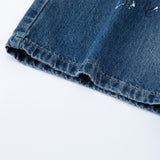 DAXUEN Distressed medium-blue wide leg denim jeans with paint splatters