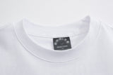 DAXUEN Oversized short-sleeved t-shirt with distressed text print