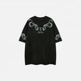 Front view of the black Vintage Oversized Embroidered T-Shirt in a gray background