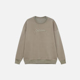 Front view of the khaki Modern Classic Sweatshirt in a gray background