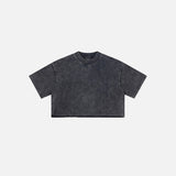 Front view of the black Women's Retro Washed Distressed T-shirt in a gray background