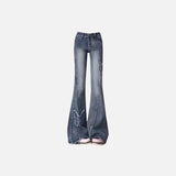 Front view of the blue Vintage Edge Flare Jeans in a gray background