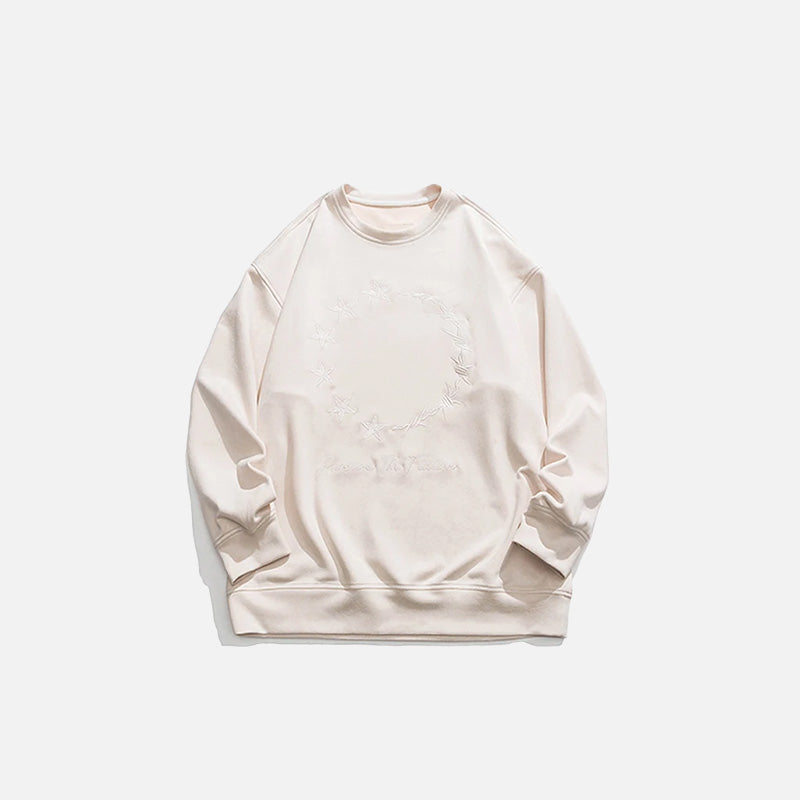 Front view of the beige Loose  Embroidered Sweatshirt in a gray background