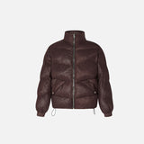 Front view of the coffee winter Oversized Puffer Jacket in a gray background 