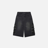 Front view of the black Side-Ripped Washed Jorts in a gray background 