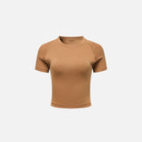 Front view of the caramel Women's Sports T-shirt in a gray background 