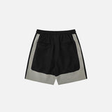 Back view of the black Contrast Color Drawstring Sports Shorts in a gray background