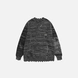Front view of the grey Loose Ripped Knitted Sweater in a gray background 