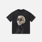 Front view of the black Man On A Mission T-Shirt in a gray background