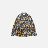 Front view of the yellow Cyclist Floral Patterned Shirt in a gray background