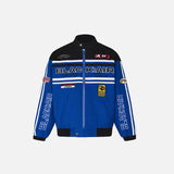 Front view of the blue Motorsports Embroidered Racing Jacket in a gray background 