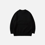Back view of the Depressed Dinosaur Loose Sweater in a gray background