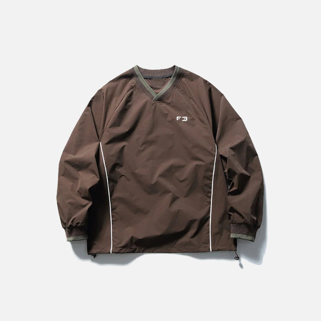 Front view of the brown Metro Breeze Windbreaker Sweatshirt in a gray background