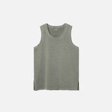 Front view of the grey green Side Slit Unisex Sleeveless T-shirt in a gray background 