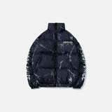 Front view of the blue Urban Chaos Teddy Jacket in a gray background