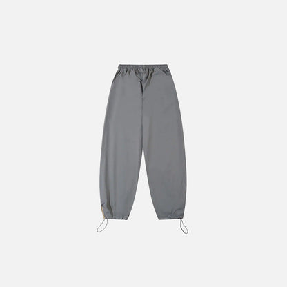 Back view of the gray Y2K Patchwork Joggers Baggy Pants in a gray background