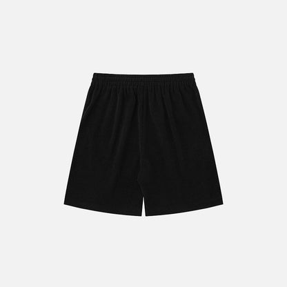 Back view of the black "Refused Change!" Printed Shorts in a gray background 