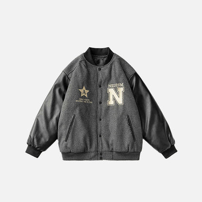 Front view of the dark grey Neoism Varsity Jacket in a gray background