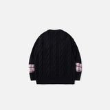 Back view of the black Plaid Accent Knit Sweater in a gray background