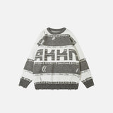 Front view of the gray Oversized Ripped Loose Sweater in a gray background 