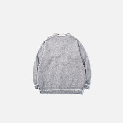 Back view of the grey Vintage Drawstring Oversized Sweater in a gray background