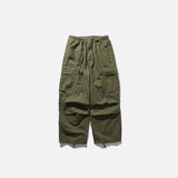 Front view of the green Adventure-Ready Cargo Pants in a gray background 