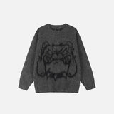 Front view of the gray Bulldog Loose Knitted Sweater in a gray background