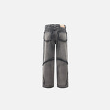 Front view of the black Crisscross Stitch Baggy Jeans in a gray background