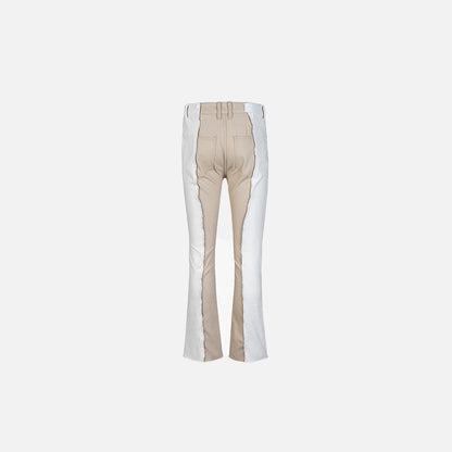 Back view of the white Dual-Tone Wave Flare Jeans in a gray background