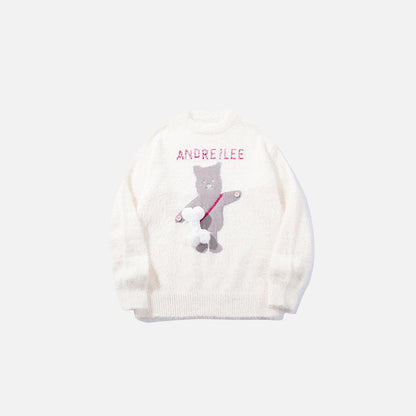 Front view of the apricot Graphic Bear Embroidered Sweater in a gray background