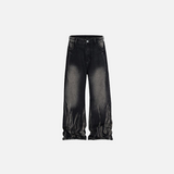 Front view of the black Laser Texture Straight Jeans in a gray background