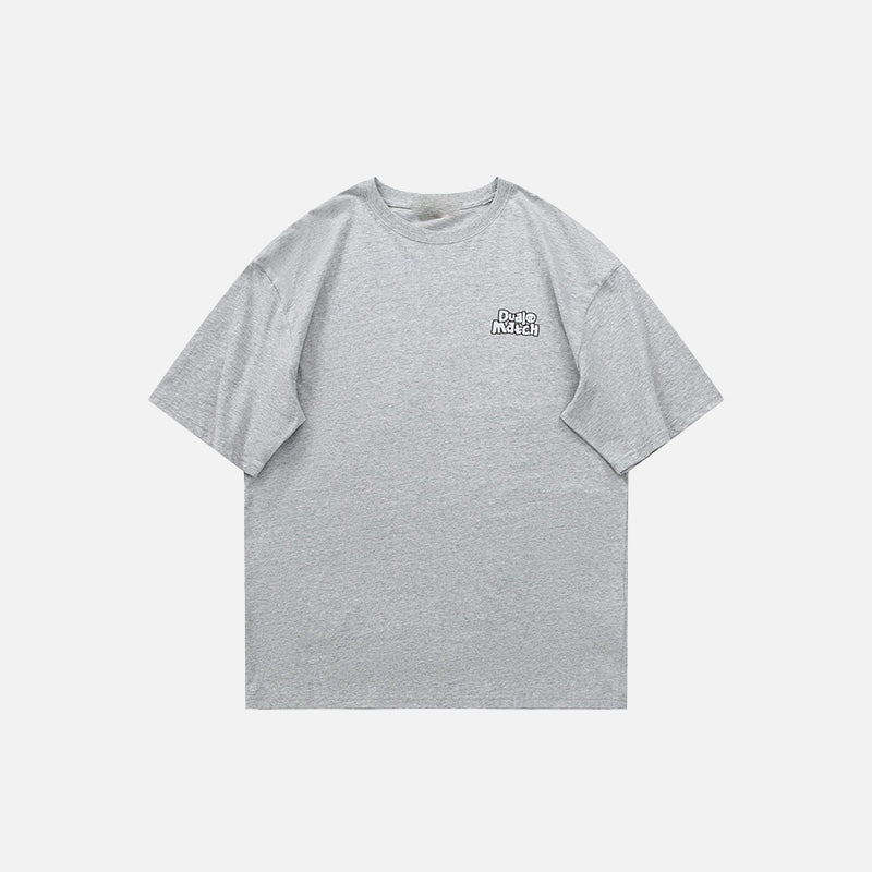 Front view of the grey Loose Short-sleeved Motivate T-Shirt in a gray background 